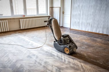 Professional grinding machine for parquet. Industrial theme
