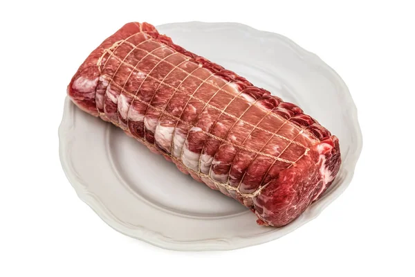 Vlees Van Uitgebeend Varkensvlees Verpakt Netten Wit Geïsoleerde Plaat — Stockfoto