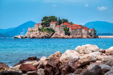 Sveti Stefan island in Budva in a beautiful summer day, Montenegro. Travel and vacation theme
