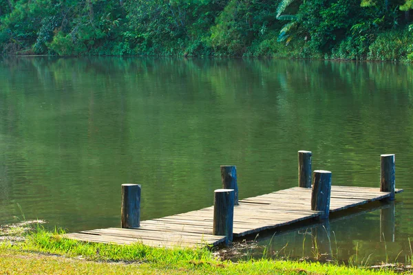 Wood bridge in lagoon — Stock Photo, Image