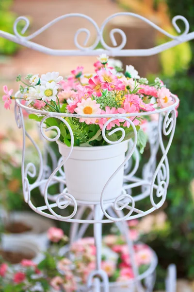 Plastic flower on bicycle — Stock Photo, Image