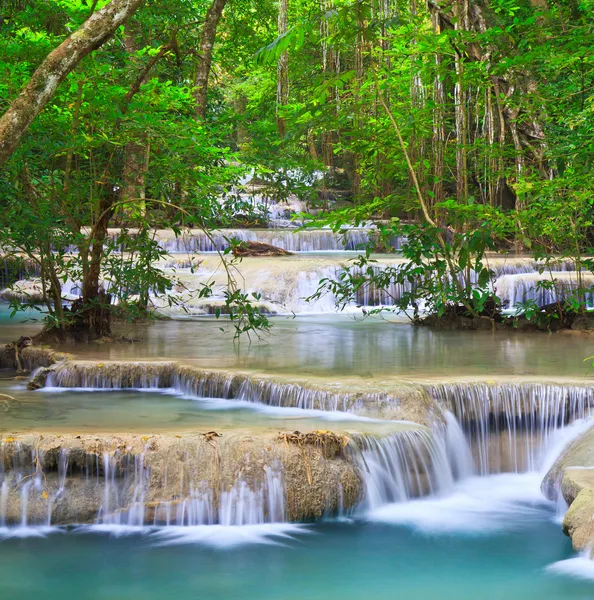 Waterfall and blue stream — Stock Photo, Image