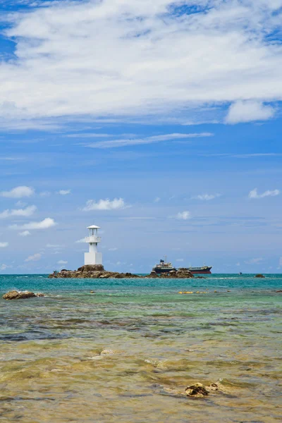 Lighthouse in the sea — Stock Photo, Image