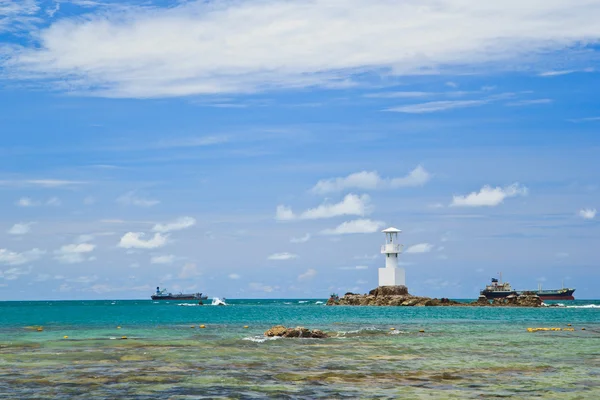 Lighthouse in the sea — Stock Photo, Image