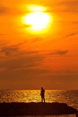 Angler sunset clipart