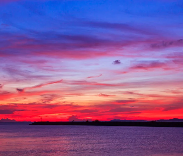 Pôr do sol céu azul — Fotografia de Stock