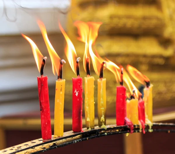 Lighting prayer candle