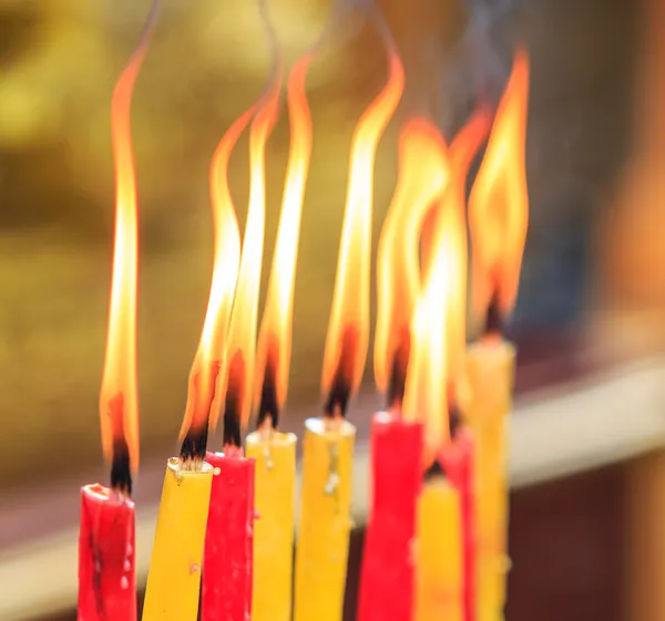 Lighting prayer candle — Stock Photo, Image