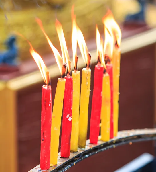 Lighting prayer candle — Stock Photo, Image