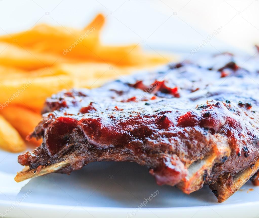 Grilled pork ribs. With tomato sauce