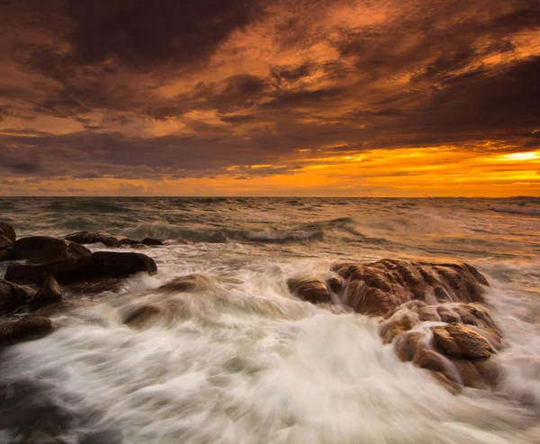 Sunset over sea rocks — Stock Photo, Image