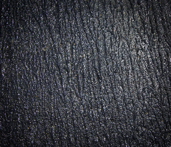 พื้นหลังยางมะตอยมืด — ภาพถ่ายสต็อก
