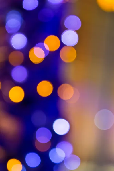 Luces borrosas de Navidad por la noche —  Fotos de Stock