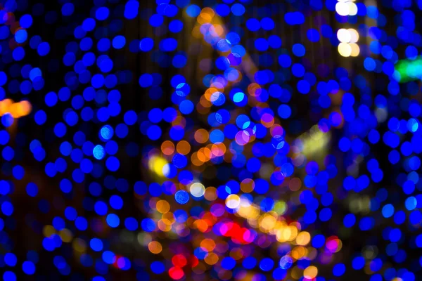 Rozmazané vánoční světla v noci — Stock fotografie