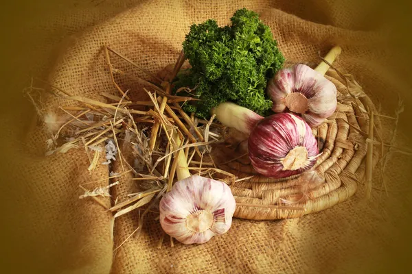 Pink garlic on a plate — Stock Photo, Image