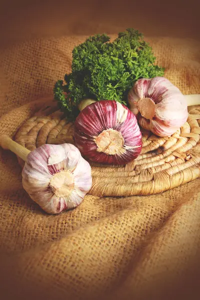 Pink garlic on a plate — Stock Photo, Image