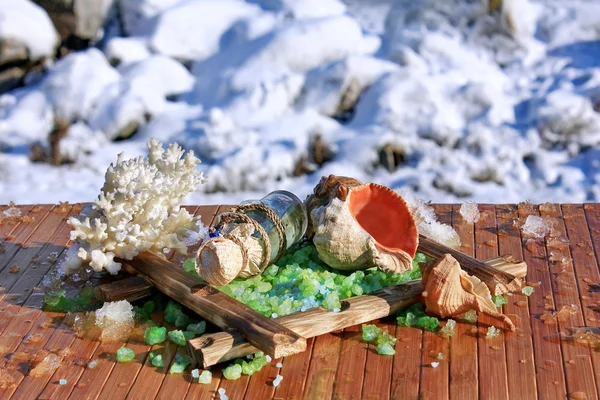 Oil and salt on the background of the sea in winter — Stock Photo, Image