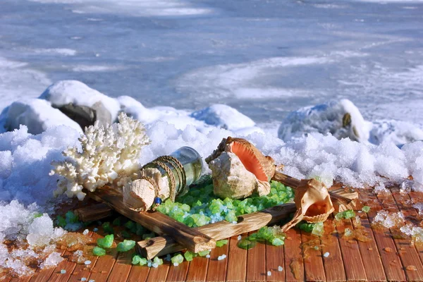 Oil and salt on the background of the sea in winter — Stock Photo, Image