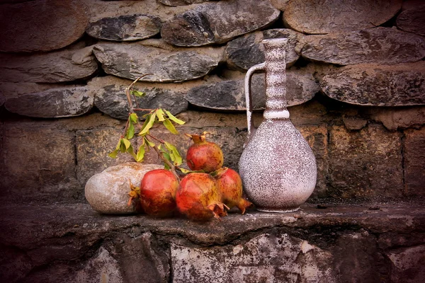 Tangerines and pineapple guava with a flower on a wooden board — Stock Photo, Image