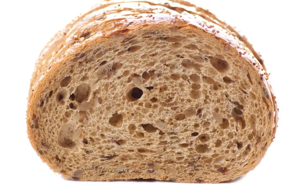 Pane intero sano a fette con semi di girasole su b bianco — Foto Stock
