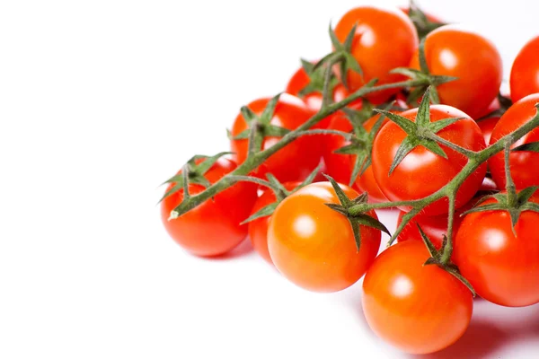 Juicy organic Cherry tomatoes isolated over white background — Stock Photo, Image