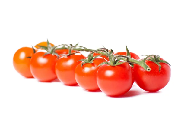 Juicy organic Cherry tomatoes isolated over white background — Stock Photo, Image