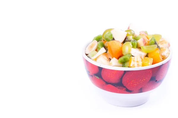 Placa de um saboroso frutas cortadas isoladas em um fundo branco . — Fotografia de Stock