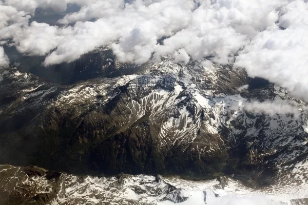 Aerial view on mountains from an airplane — Stock Photo, Image