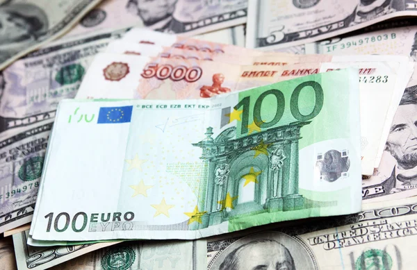 Dinero de diferentes países: dólares, euros y ruso moderno —  Fotos de Stock