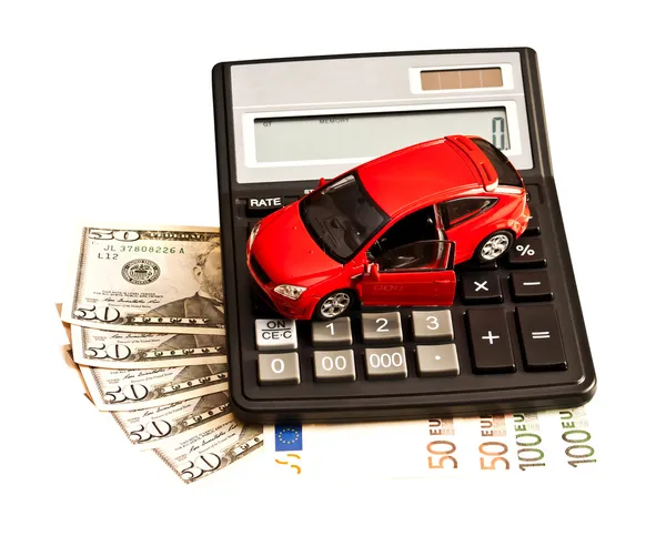 Toy car, money and calculator over white. Concept for buying, re — Stock Photo, Image