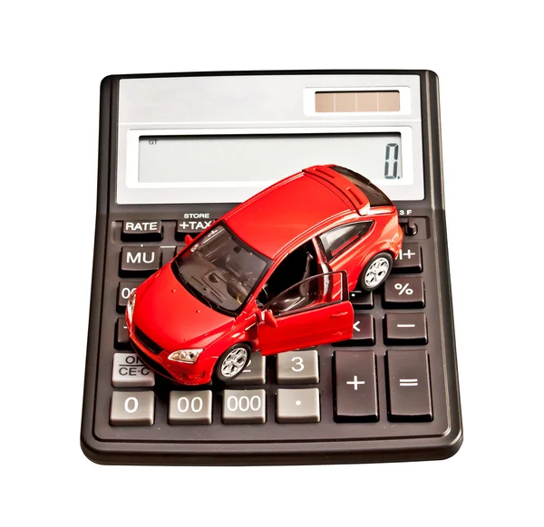 Carro de brinquedo e calculadora sobre branco. Conceito para comprar, alugar , — Fotografia de Stock