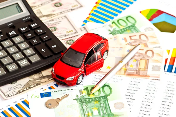 Spielzeugauto, Geld und anderes kaufmännisches Personal — Stockfoto