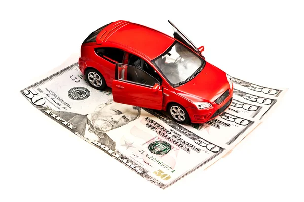 Coche de juguete y dinero sobre blanco. Concepto de coche de alquiler, compra o seguro Imagen de stock