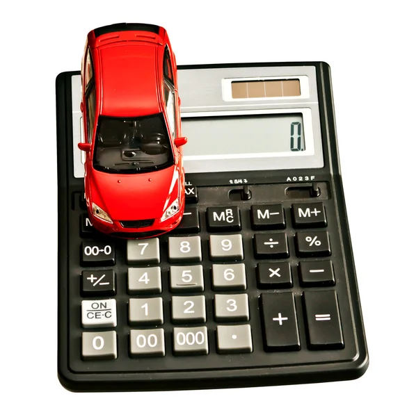 Carro de brinquedo e calculadora. Conceito para comprar, alugar, seguro , — Fotografia de Stock