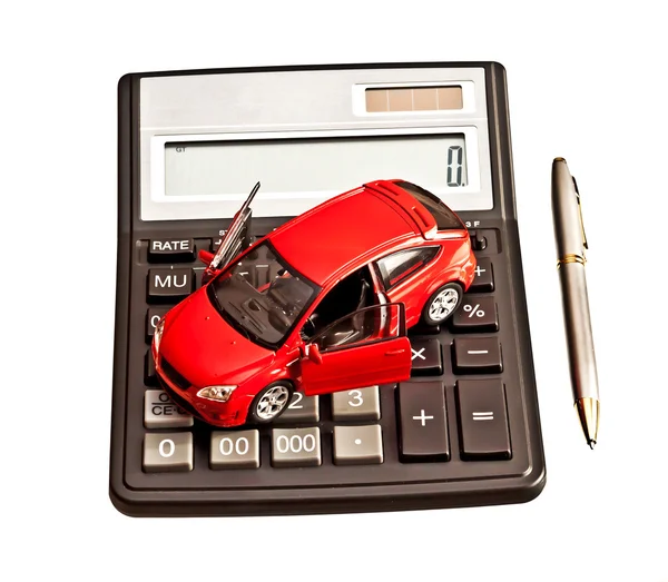 Coche de juguete y calculadora sobre blanco. Alquiler, compra, reparación o insuranc Imágenes de stock libres de derechos