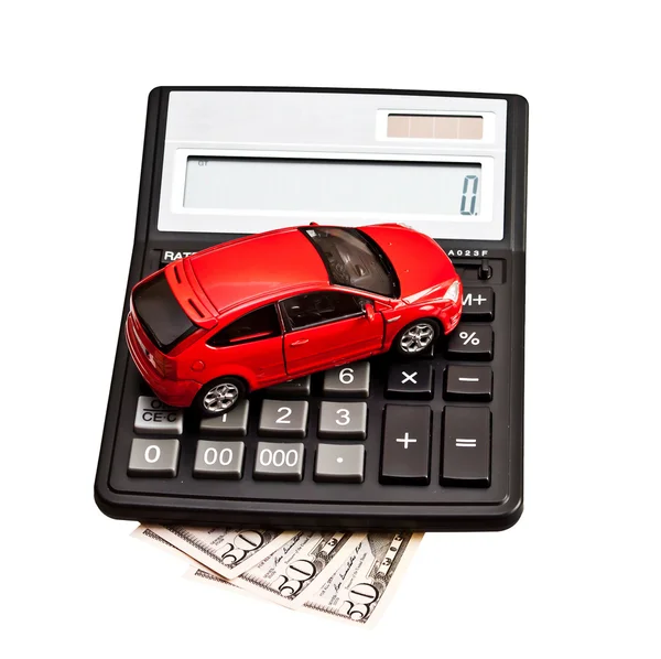 Carro de brinquedo e calculadora sobre branco. Conceito para comprar, alugar , — Fotografia de Stock