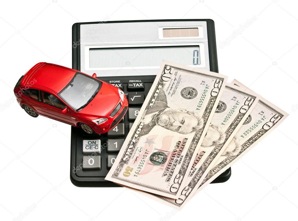 Toy car and calculator. Concept for buying, renting, insurance,