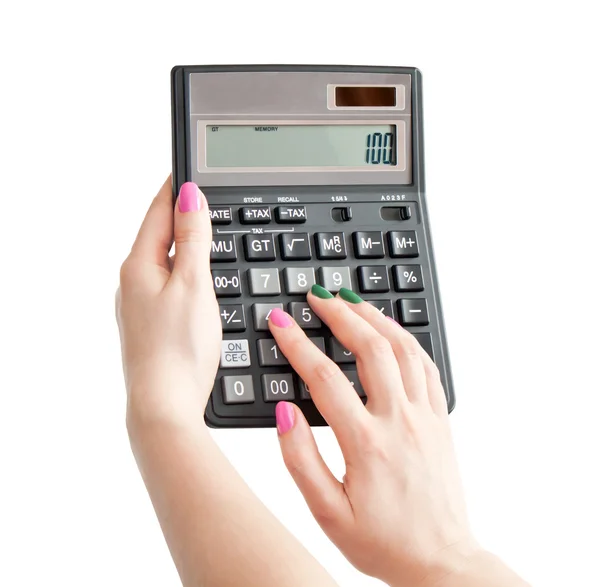 Calculadora na mão da mulher — Fotografia de Stock