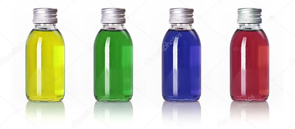 Bottles in a row with colored liquid