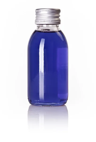 Flasche mit blauer Flüssigkeit — Stockfoto