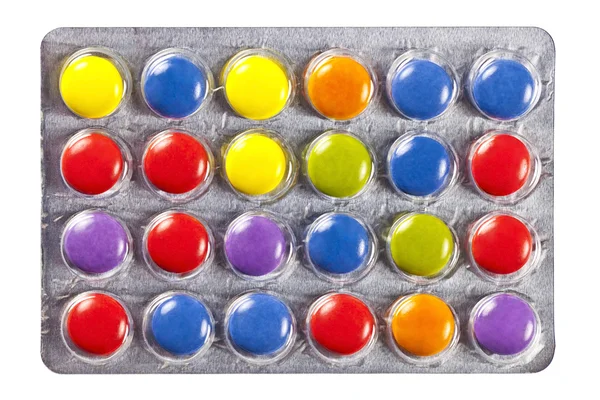 Blister com comprimidos multicoloridos — Fotografia de Stock