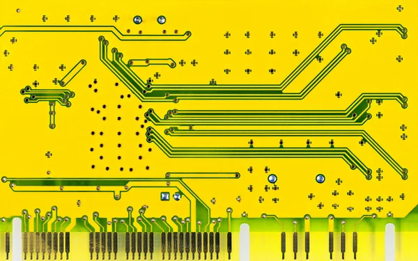 Close up of a yellow computer microcircuit — Stock Photo, Image