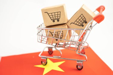 Online alışveriş arabası logosu ve Vietnam bayrağı olan kutu, İthalat İhracat Alışveriş çevrimiçi veya ticari finans dağıtım mağazası servis hizmetleri nakliyat, ticaret, tedarikçi kavramı.
