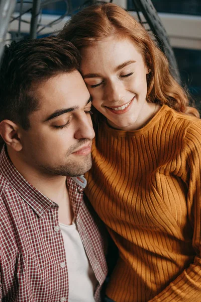 Close up portrait of a caucasian couple ambracing and enjoying each other with closed eyes. Beauty face. Closeup portrait. — 스톡 사진