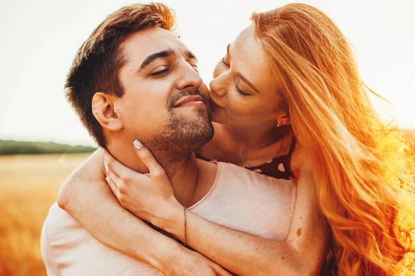 Couple in love have fun in golden field. Family time. — Stockfoto