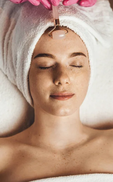 Woman Receiving Facial Massage Treatment Jade Roller Girl Facial Treatment — Fotografia de Stock