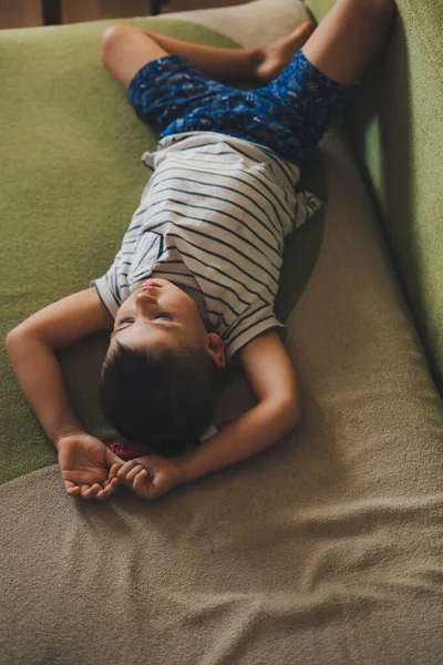 Portrait Boy Laying Her Back Sofa Home Family Concept Happy —  Fotos de Stock