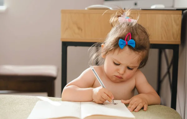 Little Baby Girl Sitting Table Trying Write Letters Adult Concept — Foto de Stock