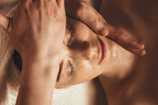Beautiful Freckled Woman Getting Face Massage Beauty Salon — Fotografia de Stock