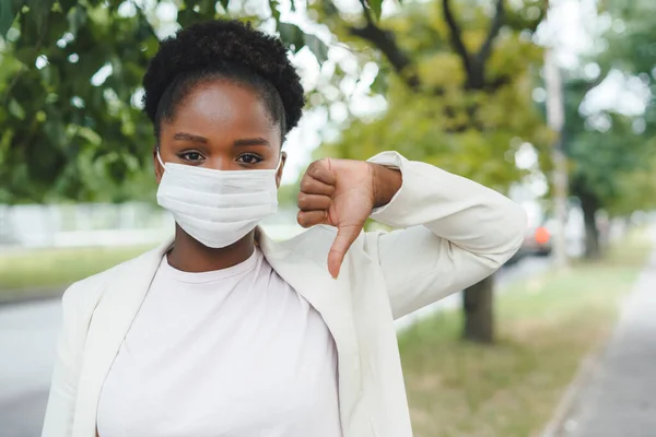 Copy Space Portrait Afro Woman Surgical Mask Showing Thumbs Gesture - Stock-foto